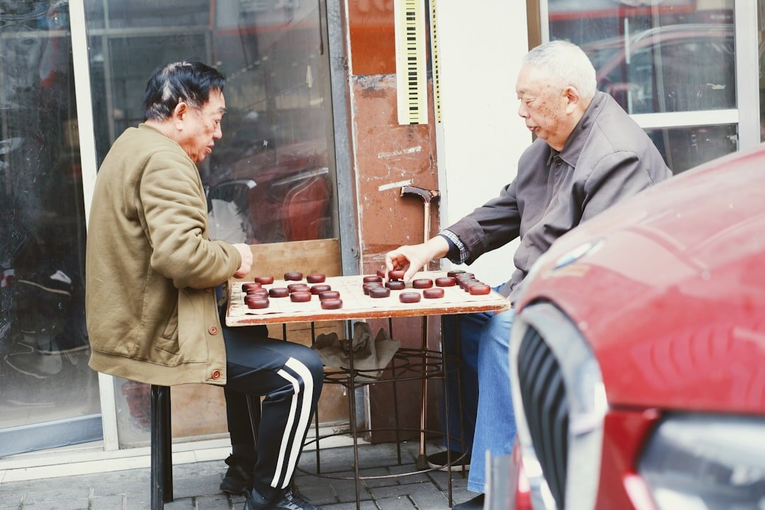 Seniors sharing tea and pastries at a friendly gathering