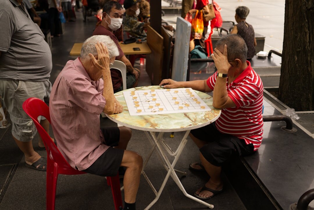 seniors playing board games together