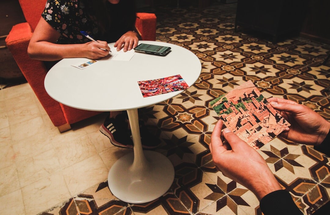 Seniors playing board games and cards around a table