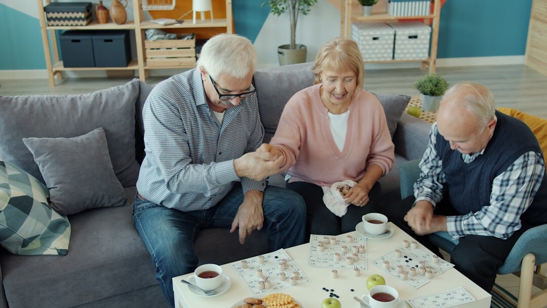 senior friends chatting in lounge